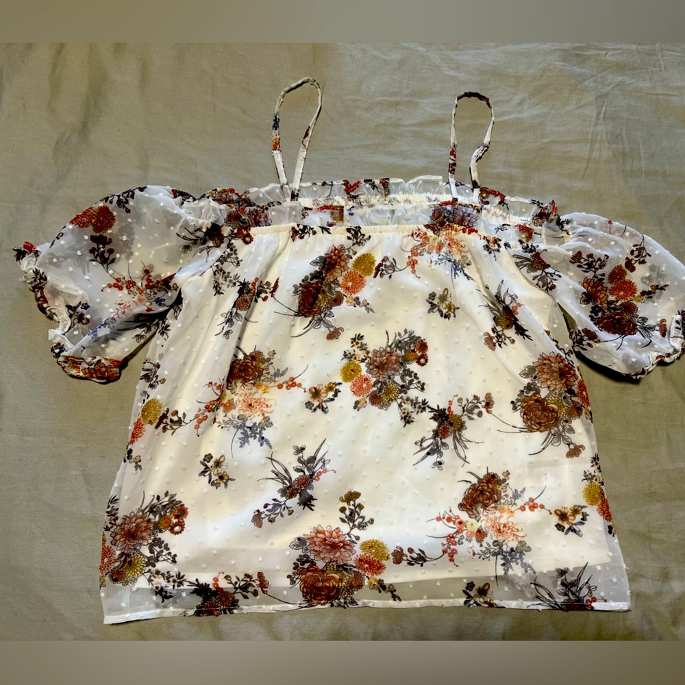 A tank top, off the shoulder white shirt